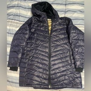Woman’s Columbia Joy Peak Mid Insulated Hooded Jacket.